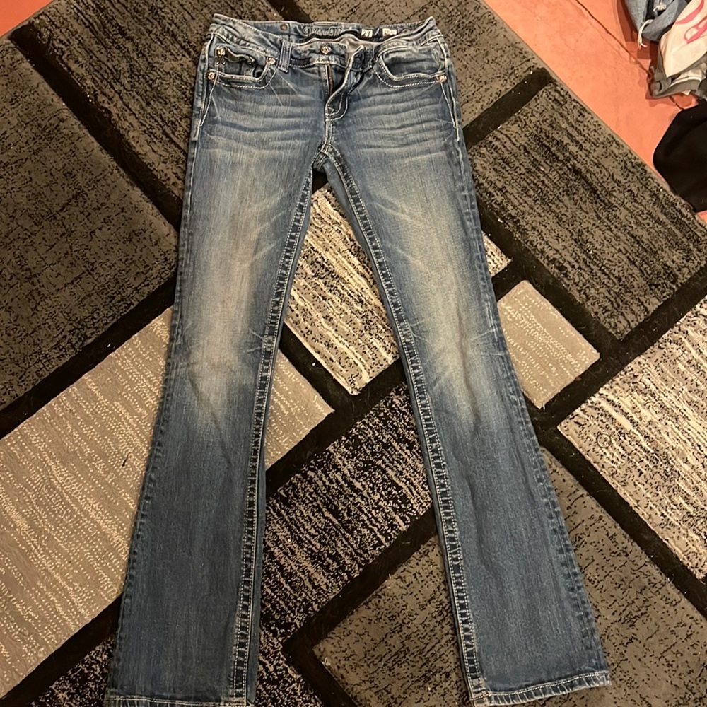 Women’s Miss Me bootcut blue jeans size 27.